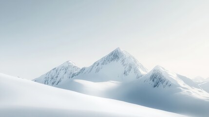 Obraz premium A serene winter mountain landscape bathed in soft light.