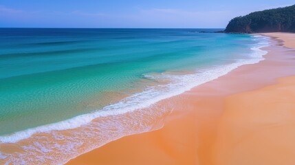 A breathtaking aerial view of a scenic beach with clear blue water and sandy shores, perfect for a travel background.