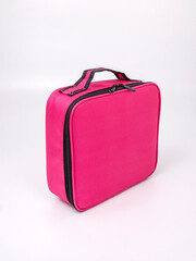 Big red suitcase cosmetic bag on white background
