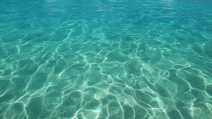 Clear Turquoise Water with Light Reflections and Subtle Ripples