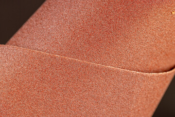 several different sheets of sandpaper for metal or wood processing