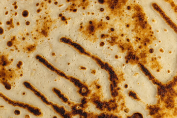 pancakes made from milk with wheat flour of varying degrees of roasting