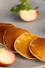 melting butter on baked pancakes, pancakes made from milk with flour on which butter melts
