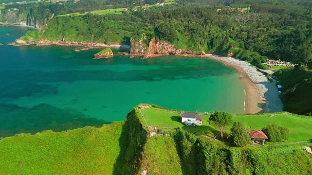 Aerial view of a Ermita de la Regalina on the steep cliffs in Asturias, Spain