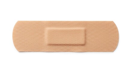 Obraz premium Beige adhesive bandage on white background