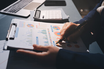 Expert woman asian female people review data number costing managerial account prepare monthly...