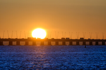 Vasco da Gama Bridge at sunrise with lots of tourist traffic