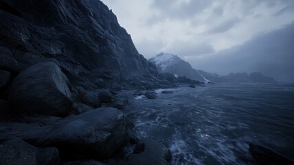 Fototapeta premium Dark Rocky Shoreline with Snow Capped Mountains Under A Cloudy Sky Rugged Coastal Terrain And Dramatic Lighting On A Nature Scenery Of Seascape