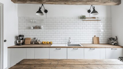 Industrial metal wall lamp above a thick plank farmhouse table in a rustic kitchen with white cabinets and exposed ceiling beams