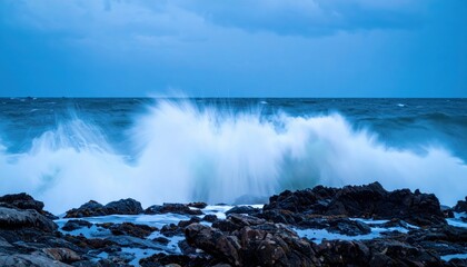 Obraz premium Waves crashing on rocky shore coastal area nature photography stormy environment wide angle view ocean power