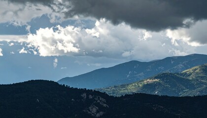 Dramatic clouds over mountain range scenic landscape nature photography outdoor environment aerial view atmospheric beauty