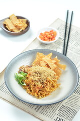 Indonesian Fried Noodles dish, mie goreng, cooked with spicy spices and a unique taste.