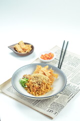 Indonesian Fried Noodles dish, mie goreng, cooked with spicy spices and a unique taste.