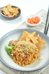 Indonesian Fried Noodles dish, mie goreng, cooked with spicy spices and a unique taste.