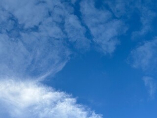 bright blue sky background with beautiful white clouds, clear sky in the afternoon