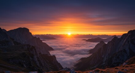 Naklejka premium Majestic sunrise over mountain peaks
