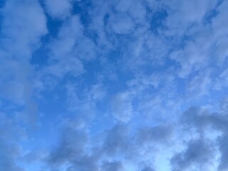 bright blue sky background with beautiful white clouds, clear sky in the afternoon