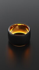Luxurious black and gold ring on a dark surface capturing elegance and modern design