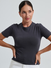 Girl model in casual clothes posing in studio, fashion photo.