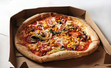 Fresh Delicious Meat And Vegetable Pizza In Cardboard Box Fast Delivered For Dinner