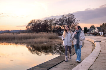 Walk along the promenade. A walk by the sea. Walking in nature. Sunset.