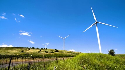 Wind turbines in a vineyard in the Golan Heights in northern Israel