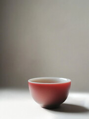 A teacup placed on top of a table surface
