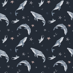 A humpback whale and a sea stingray swim in the underwater world of the ocean. Watercolor illustration. Seamless pattern. Starfish and algae from the seabed, isolated on a dark background.