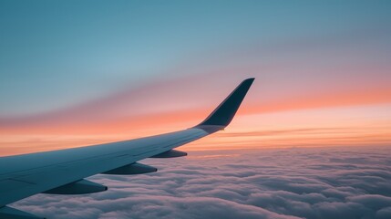 Obraz premium A plane flying over a mountain range at sunset.
