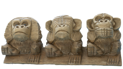 Wooden monkeys are depicted in a sitting position, with their hands covering their eyes, ears, and mouth, representing the proverbial "see no evil, hear no evil, speak no evil" concept.