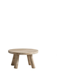 Stylish round wooden table with unique legs, perfect for indoor decor and modern living spaces