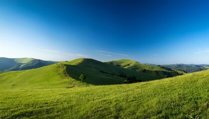 hill landscape with clear blue sky