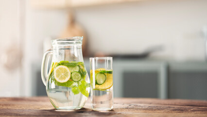 Detox water with lemon, cucumber and mint leaves	