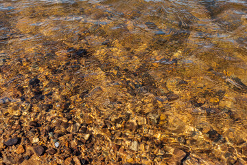 sandy and pebbles bottom of a freshwater river