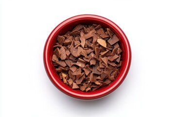 Fototapeta premium Red bowl with dry feline food bits, isolated white background