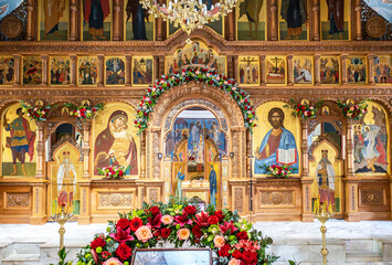 Interior Church of the Resurrection in the Holy Resurrection Monastery. Paschal Artos (Easter bread) in front of opened royal doors