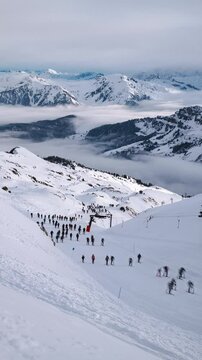 Spectators arriving to watch last stage of 39th Pierra Menta skimo race in Beaufort, France.