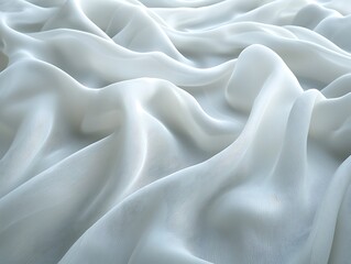 Obraz premium Closeup view of soft, flowing, white fabric drapes.