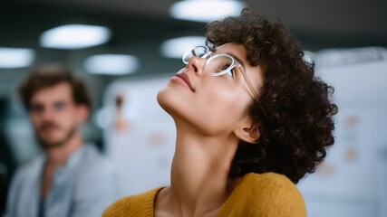 Dynamic footage of a creative team engaged in a lively brainstorming session for innovative advertising concepts.