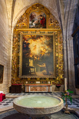 Interiors of Seville gothic cathedral in Andalusia, Spain
