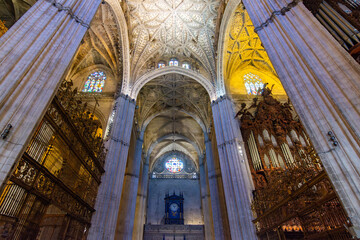 Interiors of Seville gothic cathedral in Andalusia, Spain