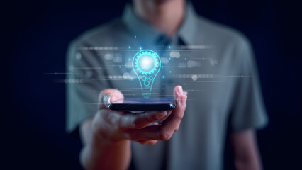 Hand of  holding illuminated light bulb, Idea innovation and inspiration concept.  creativity with bulbs that shine glitter, Concept for success.