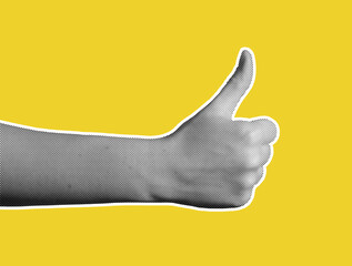 Hand with thumb up, showing approval and agreement. Gesture of support, acceptance, and confirmation