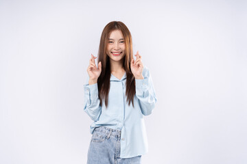 Photo on white background of brown hair woman blinking one eye and praying for good luck and dreams...