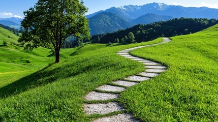 A winding stone path meanders through a vibrant green meadow, leading towards a majestic mountain range under a bright, sunny sky. A solitary tree
