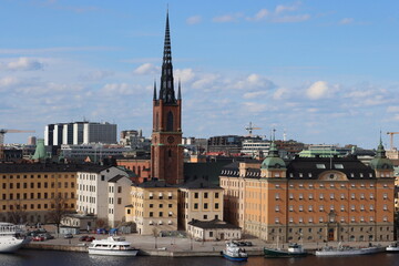 Fototapeta premium Sweden. In Stockholm, in the city center, on an island, are located The Riksdag and Riddarholmen Church. 