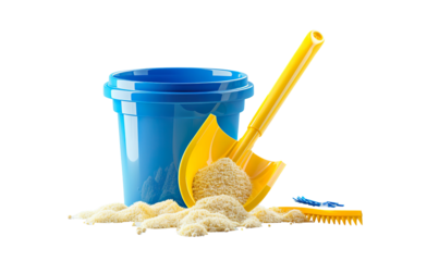 Yellow spade, and blue bucket with sand spilling out on a transparent background