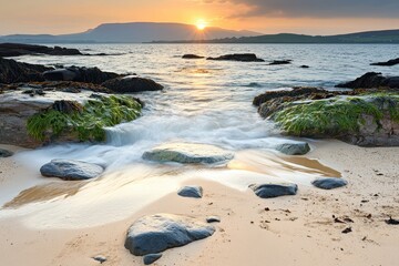 Golden sunset over a rocky beach
