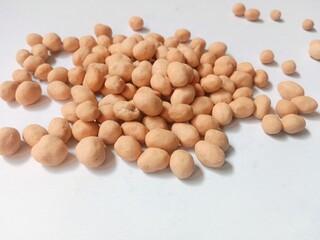 kacang madu or honey peanuts. atom peanut. egg peanut. honey peanuts are a popular snack in Indonesia made from peanuts coated with flour and spice dough. savory and crunchy.