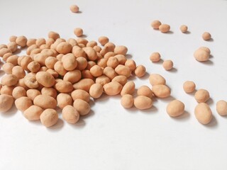 kacang madu or honey peanuts. atom peanut. egg peanut. honey peanuts are a popular snack in Indonesia made from peanuts coated with flour and spice dough. savory and crunchy.